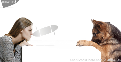 Image of Woman with her dog over white background