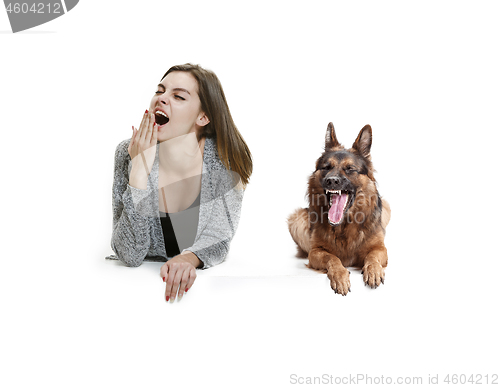 Image of Woman with her dog over white background