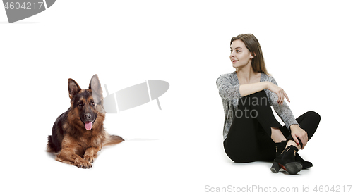 Image of Woman with her dog over white background