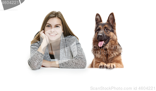 Image of Woman with her dog over white background