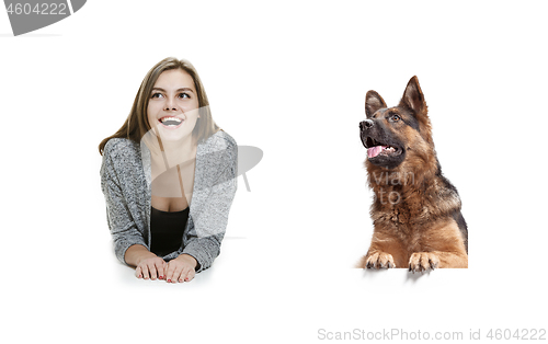 Image of Woman with her dog over white background