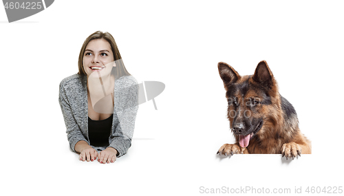 Image of Woman with her dog over white background