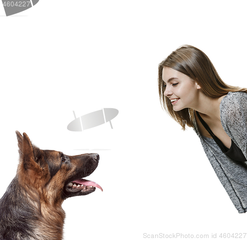 Image of Woman with her dog over white background