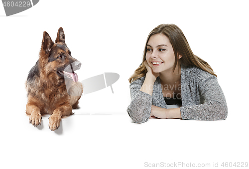 Image of Woman with her dog over white background