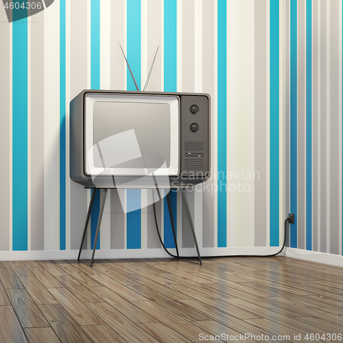 Image of old vintage tube television in seventies style room