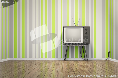 Image of old vintage tube television in seventies style room