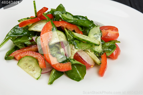 Image of Vegetable salad on white plate