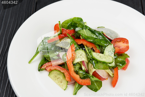 Image of Vegetable salad on white plate