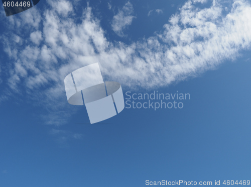 Image of dark blue sky with clouds background