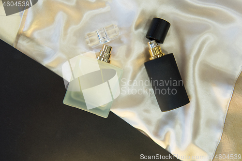 Image of Flat lay composition with two perfume bottles