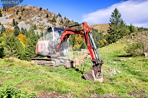 Image of A digger in the mountains