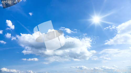 Image of typical beautiful blue sky sun clouds background