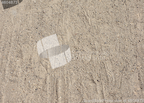 Image of footprints in the sand background