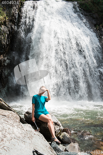Image of Woman at Korbu Waterfall