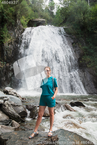 Image of Woman at Korbu Waterfall