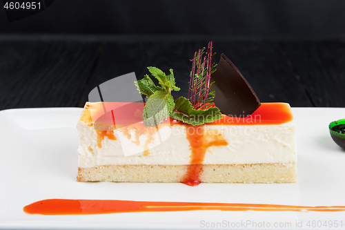 Image of Cheesecake with sauce