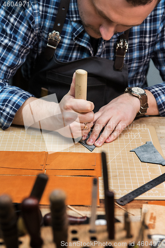 Image of Concept of handmade craft production of leather goods.