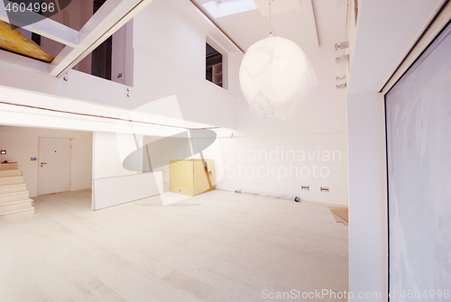 Image of Interior of empty stylish modern open space two level apartment