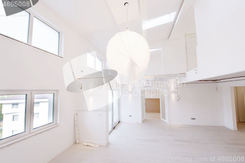 Image of Interior of empty stylish modern open space two level apartment