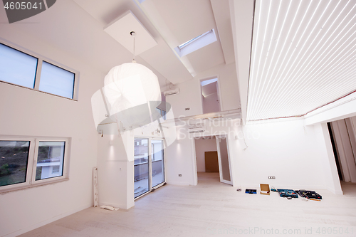 Image of Interior of empty stylish modern open space two level apartment