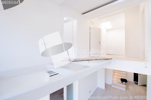 Image of Interior of empty stylish modern open space two level apartment