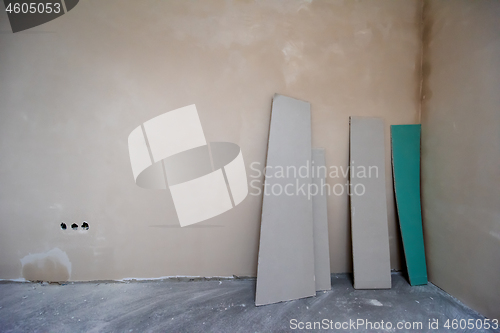 Image of interior of construction site with white drywall