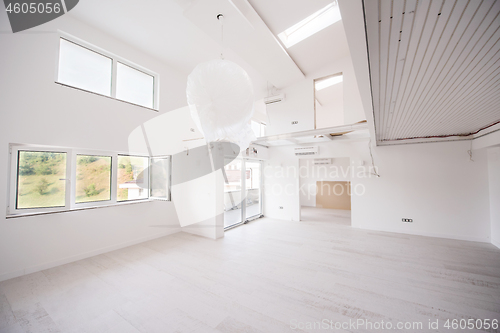 Image of Interior of empty stylish modern open space two level apartment