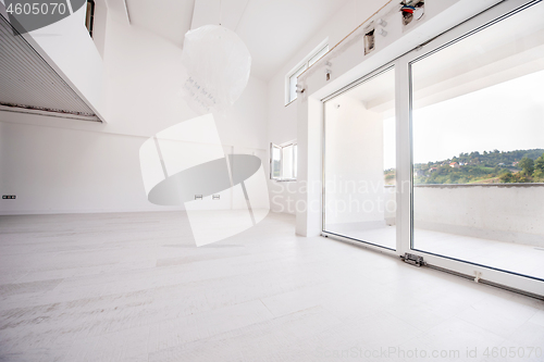 Image of Interior of empty stylish modern open space two level apartment