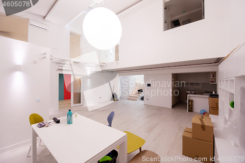 Image of Interior of empty stylish modern open space two level apartment