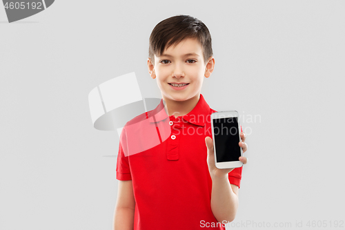 Image of smiling boy showing blank screen of smartphone