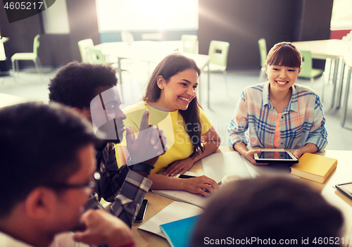 Image of group of high school students with tablet pc