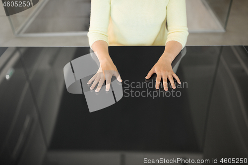 Image of close up of woman using black interactive panel