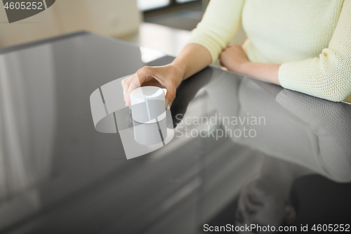 Image of close up of woman using black interactive panel