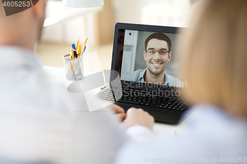 Image of business team having video conference at office