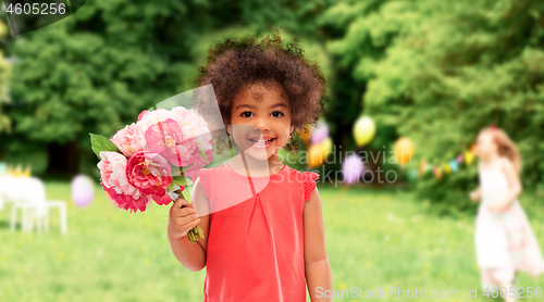 Image of happy little african american girl with flowers