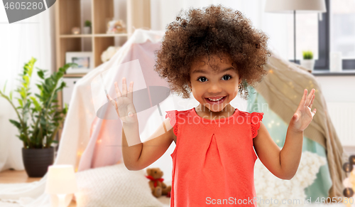 Image of happy little african american girl at home