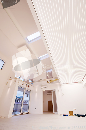 Image of Interior of empty stylish modern open space two level apartment