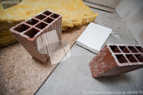 Image of red Bricks and glass wool