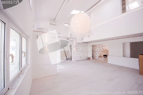 Image of Interior of empty stylish modern open space two level apartment