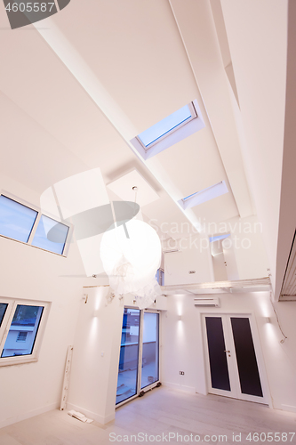 Image of Interior of empty stylish modern open space two level apartment