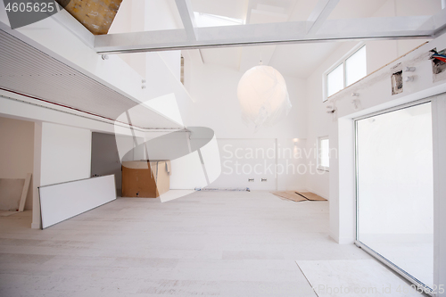 Image of Interior of empty stylish modern open space two level apartment