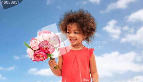 Image of happy little african american girl with flowers