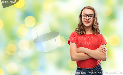 Image of smiling student girl in glasses over green lights