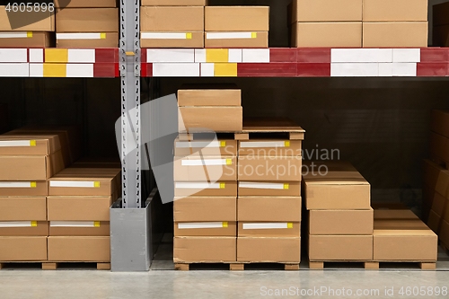 Image of Warehouse stocked with boxes in stacks