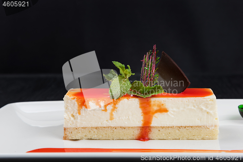 Image of Cheesecake with sauce