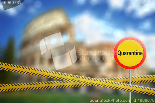 Image of Warning sign of quarantine on the blurred background of Colosseum in Rome City, Italy.