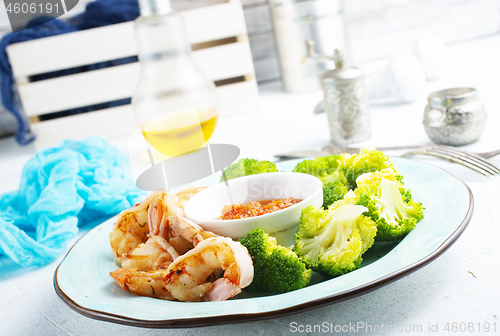 Image of fried shrimps with broccoli