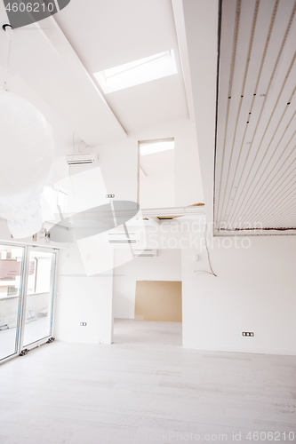 Image of Interior of empty stylish modern open space two level apartment