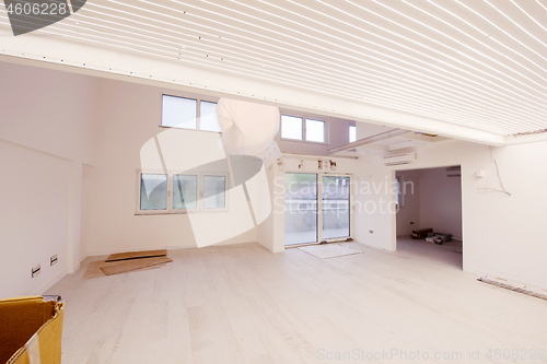 Image of Interior of empty stylish modern open space two level apartment