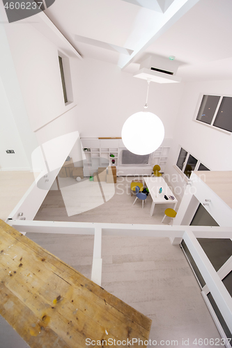 Image of Interior of empty stylish modern open space two level apartment